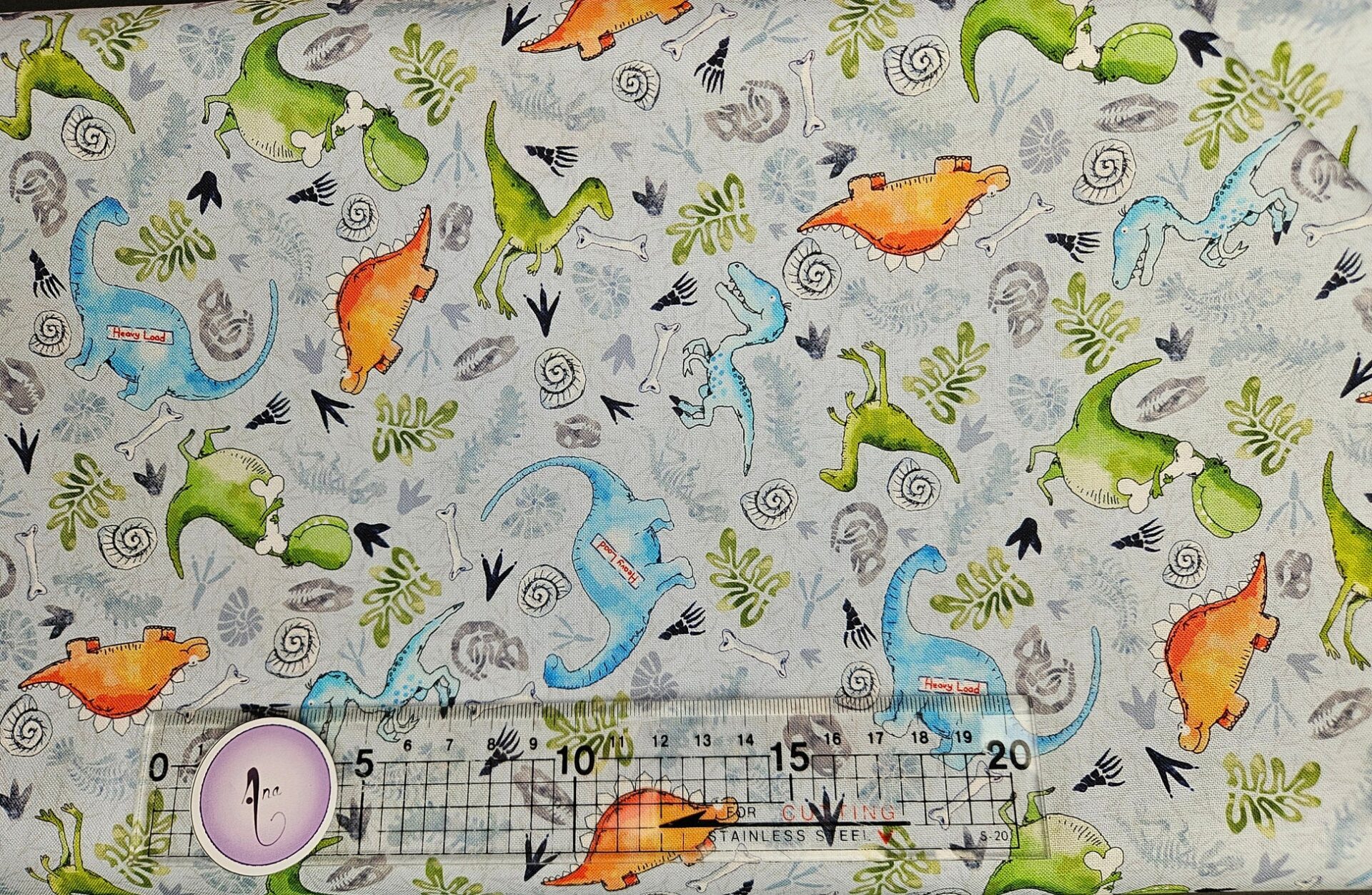 Visage Textiles - Little Dinosaurs by Susan Wheeler - Little Dinosaurs and Fossils - Scattered Dinosaurs - Pale Blue Multi - 3839 01
